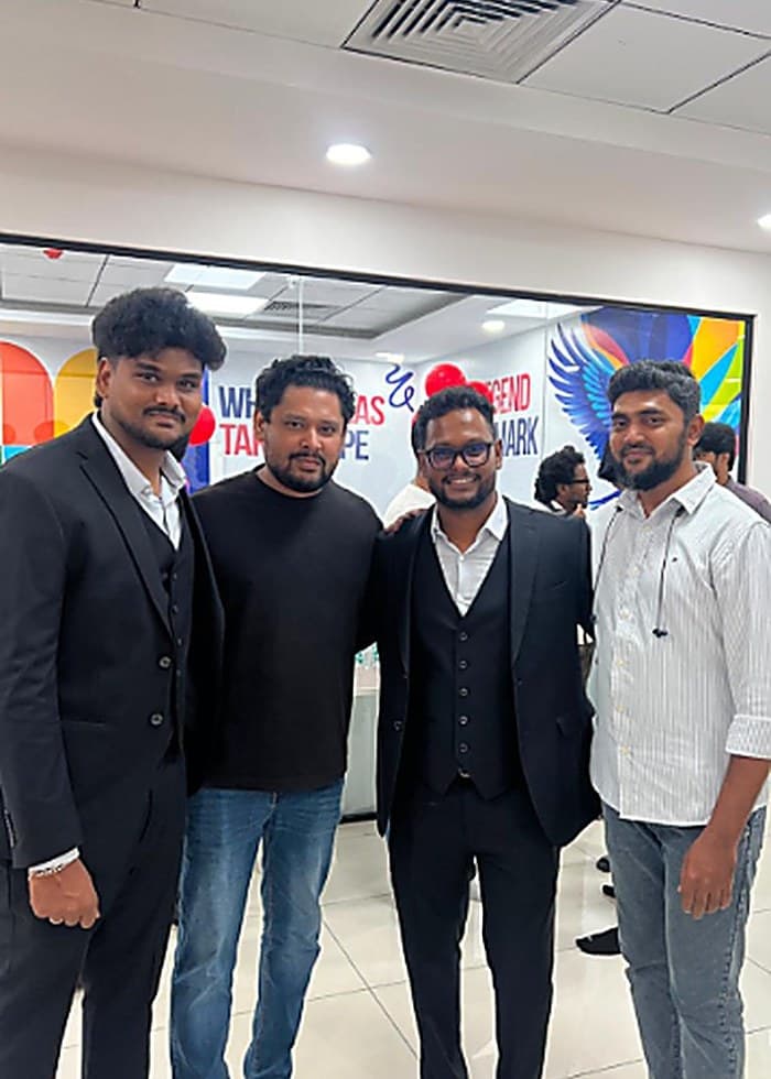 Four of the team at an industry event